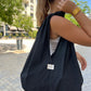 Détail du tissu revalorisé du sac Capricieuse upcycling made in France